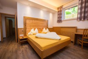 Postel nebo postele na pokoji v ubytování Apparthotel Panorama