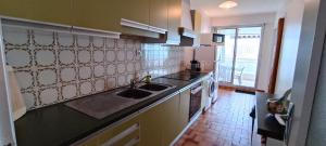 Kuchyňa alebo kuchynka v ubytovaní Valparaiso-Vue Mer-2 ch-Garage-Sables d olonne