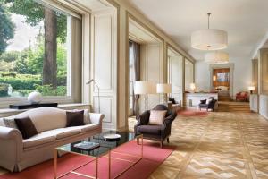 a living room with a couch and chairs at Sina Villa Medici, Autograph Collection in Florence