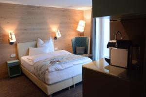 Postel nebo postele na pokoji v ubytování Bed&Bike Berliner Hof + 5 fotografií