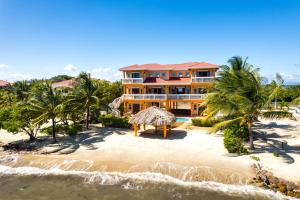 an aerial view of the resort from the beach at Villa 99-Beachfront-Pool-Luxury Villa in Placencia Village