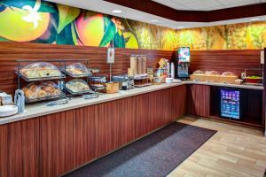 a fast food restaurant with a counter with food at Fairfield Inn and Suites by Marriott Emporia I-95 in Emporia