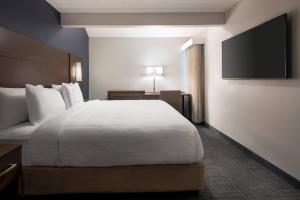 Postel nebo postele na pokoji v ubytování Residence Inn by Marriott Las Vegas Convention Center