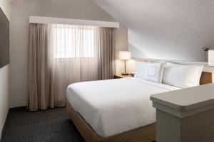 Postel nebo postele na pokoji v ubytování Residence Inn by Marriott Las Vegas Convention Center