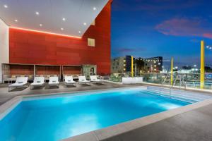 a swimming pool on the roof of a building at Courtyard by Marriott Santa Monica in Los Angeles