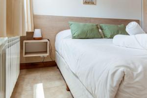 Posteľ alebo postele v izbe v ubytovaní BOG Langreo