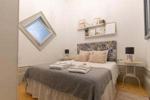Postel nebo postele na pokoji v ubytování Porto Contemporary Apartment in city center
