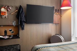 TV a/nebo společenská místnost v ubytování Moxy Austin - University