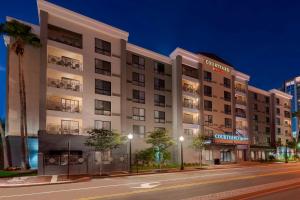 a large building on a city street at night at Courtyard Tampa Downtown in Tampa