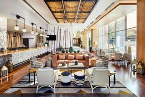 a living room with a couch and chairs at The Westin Phoenix Downtown in Phoenix