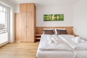 Posteľ alebo postele v izbe v ubytovaní Deluxe Apartment Lipno - Lake Side Village, Frymburk nad Vltavou