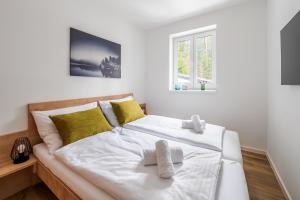 Posteľ alebo postele v izbe v ubytovaní Deluxe Apartment Lipno - Lake Side Village, Frymburk nad Vltavou