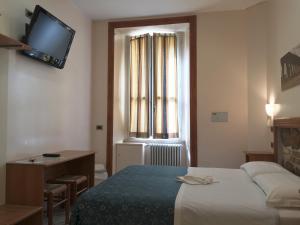 Postel nebo postele na pokoji v ubytování Optimus B&B