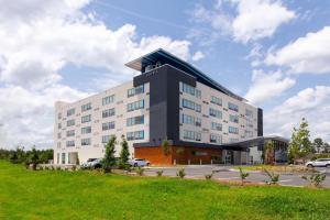 a rendering of a hotel with a parking lot at Aloft Savannah Airport in Savannah