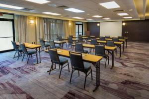 a classroom with tables and chairs in a room at Courtyard by Marriott Scranton Montage Mountain in Moosic
