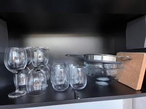 a group of wine glasses sitting on a counter at KODA Edam in Edam