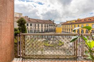 a view of a city from a fence with buildings at Dei Martiri Suite in Naples
