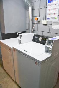 a machine in a room with a white counter at Trendy studio in Núñez in Buenos Aires