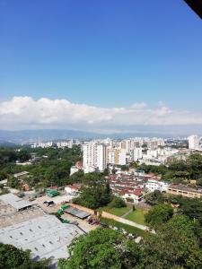 an aerial view of a city with tall buildings at Apartamento Lux Confort in Floridablanca