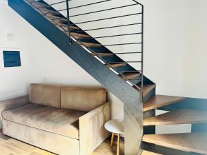 A seating area at Albola Suite Holiday Apartments
