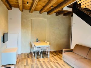 A seating area at Albola Suite Holiday Apartments