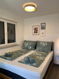 Postel nebo postele na pokoji v ubytování Ferienwohnung Amelie