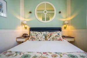 Un ou plusieurs lits dans un hébergement de l'établissement Grande Hotel do Porto
