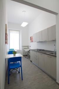A kitchen or kitchenette at Palazzo di Primavera Guest House Még 10 kép