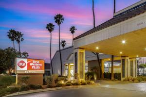 a best western plus sign in front of a building at Best Western Plus Big America in Santa Maria