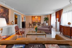 a living room with a couch and a table at Sheraton Buenos Aires Hotel & Convention Center in Buenos Aires