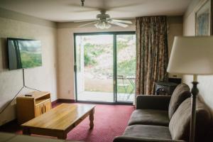 a living room with a couch and a table at Friday Harbor Suites in Friday Harbor