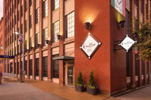 a brick building with signs on the side of it at The Westin St. Louis in Saint Louis