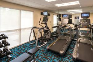 a gym with treadmills and elliptical machines at Fairfield Inn & Suites by Marriott Nashville at Opryland in Nashville