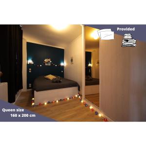 Posteľ alebo postele v izbe v ubytovaní Air-conditioned flat with terrace - Private & independent - Lourdes