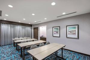 a classroom with tables and chairs in a room at TownePlace Suites by Marriott Austin Northwest The Domain Area in Austin