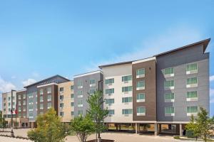 a rendering of the exterior of a hotel at TownePlace Suites by Marriott Austin Northwest The Domain Area in Austin