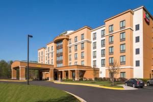 a rendering of the front of a hotel at Courtyard Fort Meade BWI Business District in Annapolis Junction