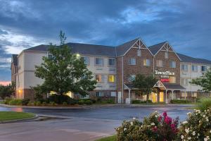 a rendering of the front of a hotel at TownePlace Suites Wichita East in Wichita