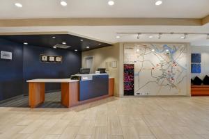 an office with a desk and a wall with a map at TownePlace Suites by Marriott Alexandria in Alexandria