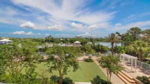 an aerial view of a park with a lawn and trees at Laketown Wharf #101 by Nautical Properties Vacation Rentals in Panama City Beach
