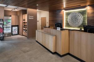 a lobby of a store with a counter in a store at Fairfield Inn & Suites by Marriott Savannah I-95 North in Port Wentworth