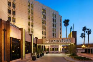 a hotel with a sign that reads sheraton at Sheraton Riyadh Hotel & Towers in Riyadh