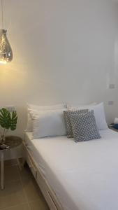 Postel nebo postele na pokoji v ubytování Apartamentos Magallanes Bayahibe
