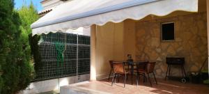 Фотография из галереи Chalet independiente con vistas en urbanización privada в Пеньисколе