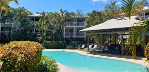 a resort with a swimming pool and a gazebo at South Pacific Resort & Spa Noosa in Noosaville