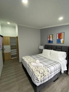 Postel nebo postele na pokoji v ubytování Cal Bed & Breakfast