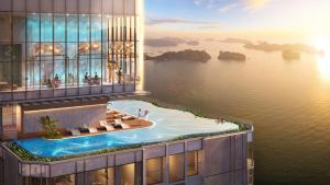uma vista aérea de um edifício com piscina em A La Carte Ha Long Bay Hotel em Ha Long