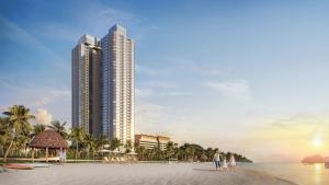 a rendering of a beach with two tall buildings at A La Carte Ha Long Bay Hotel in Ha Long