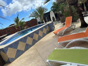 Bazén v ubytování Studio - begane grond - poolside nebo v jeho okolí