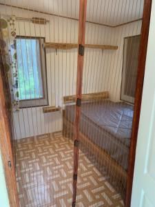 Postel nebo postele na pokoji v ubytování NADOHN2 Nai Fan Homestay